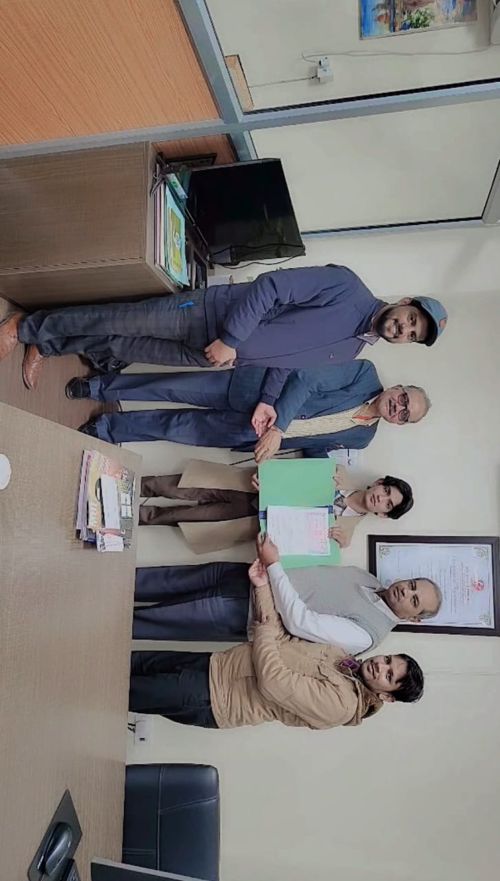 Raj Gupta At a contract signing ceremony with CSJMIF